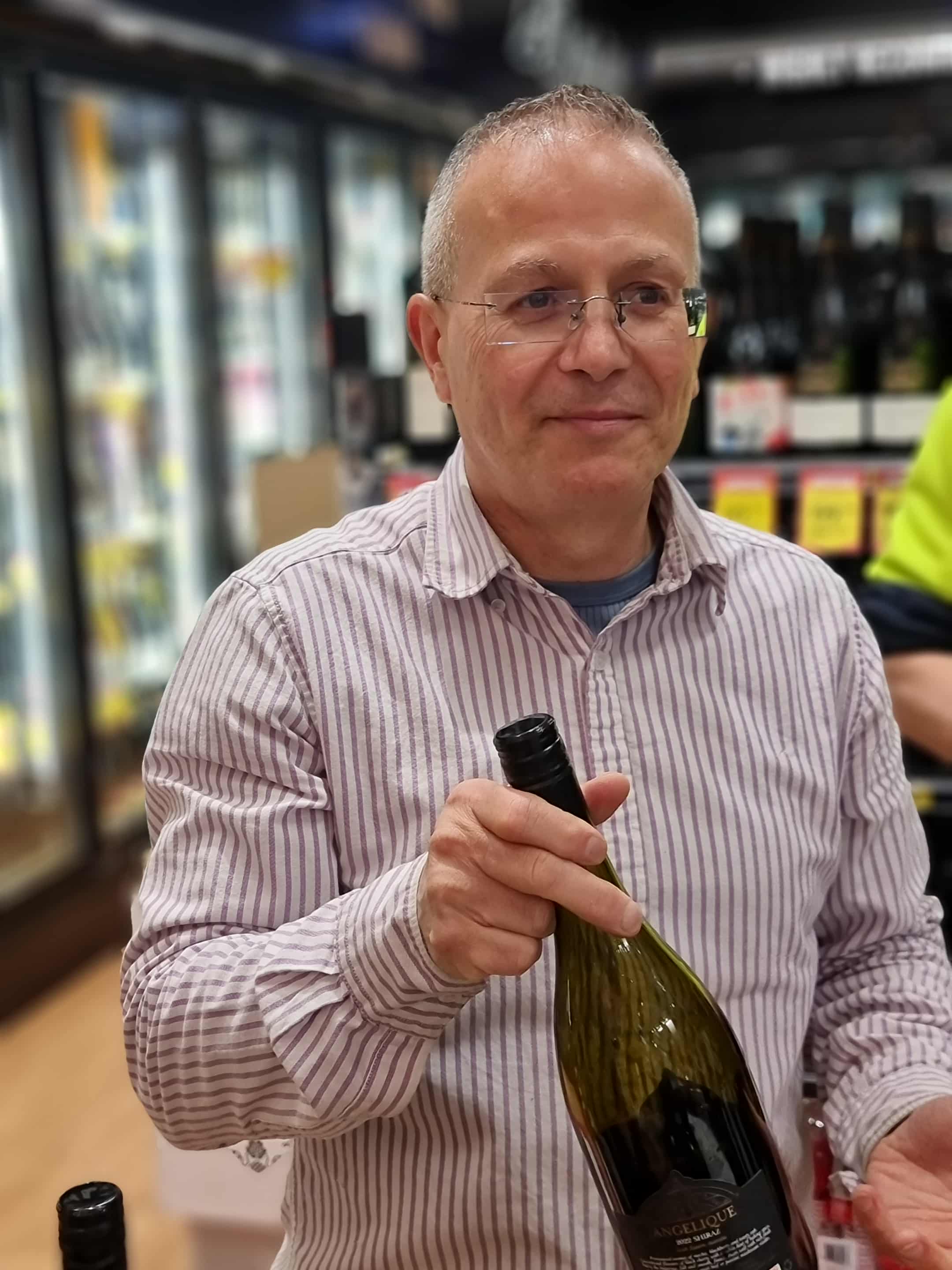 three people having a toast using three clear crystal wine glasses