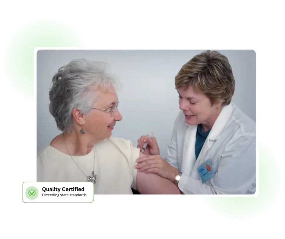 Physical therapist guiding an older male patient through balance exercises in a bright rehab gym.
