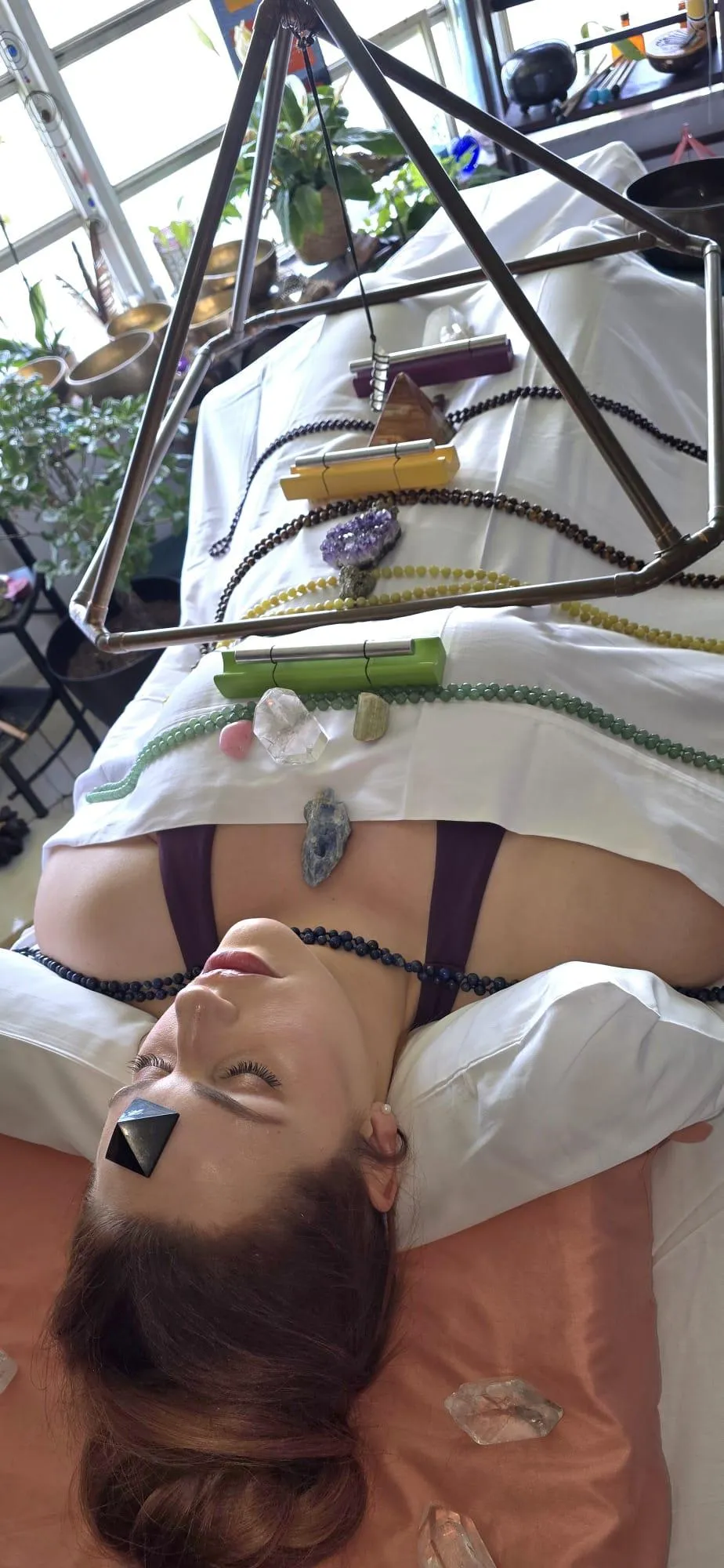 Person on a table receiving healingReiki and energy healing  