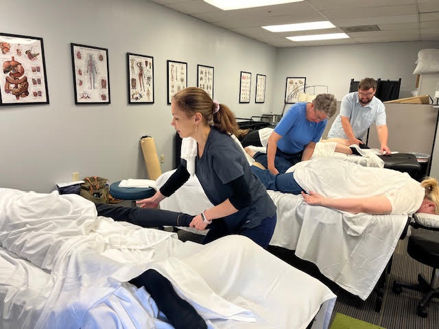 students giving massages