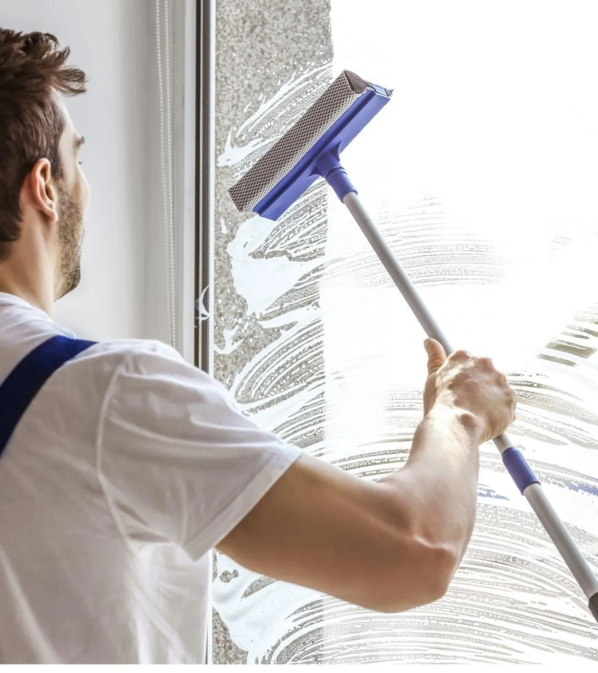 person washing hand on sink