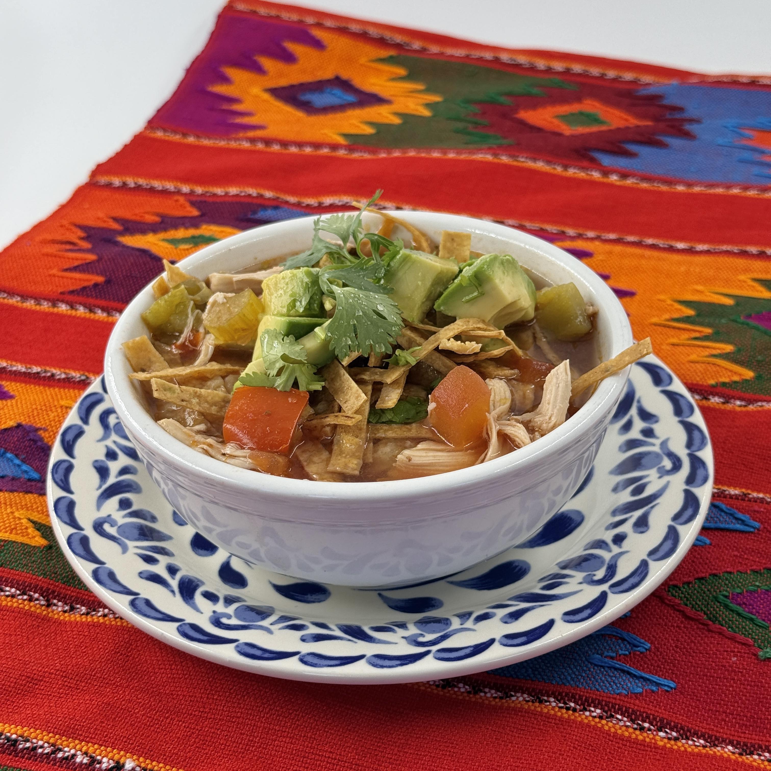 Chicken tortilla soup- Savor classic Mexican soup with a flavorful broth seasoned with garlic, cumin, and lime. Enjoy it with shredded chicken, tomatoes, sweet corn, topped with crunchy tortilla strips and queso fresco.