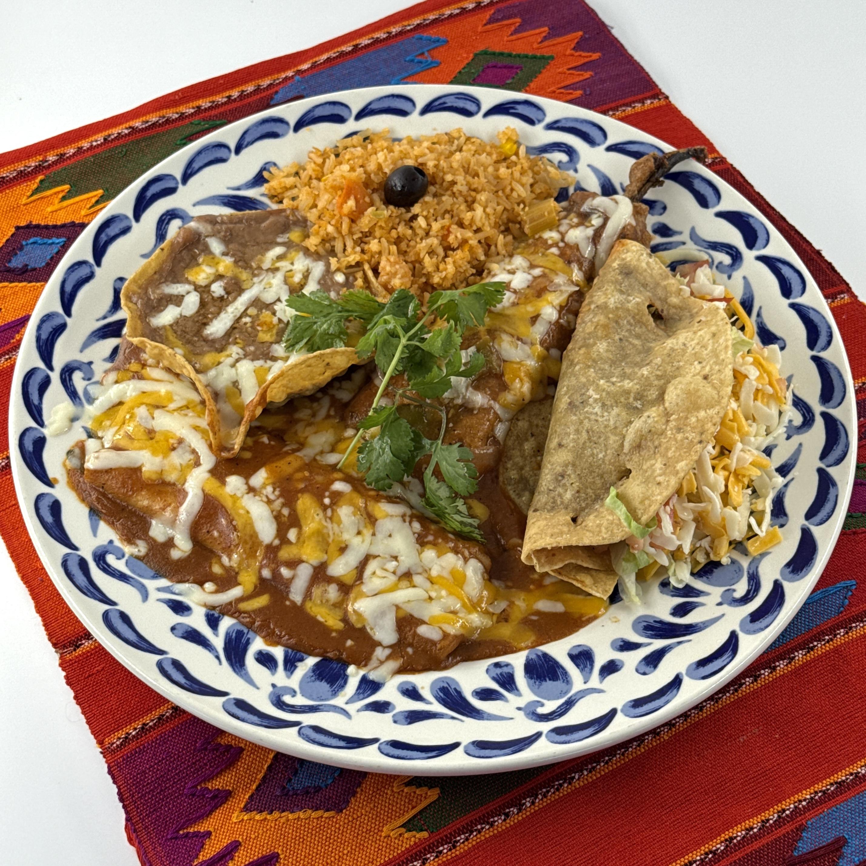 EL BANDIDO, A beef taco, cheese enchilada and chile relleno. Served with rice and beans