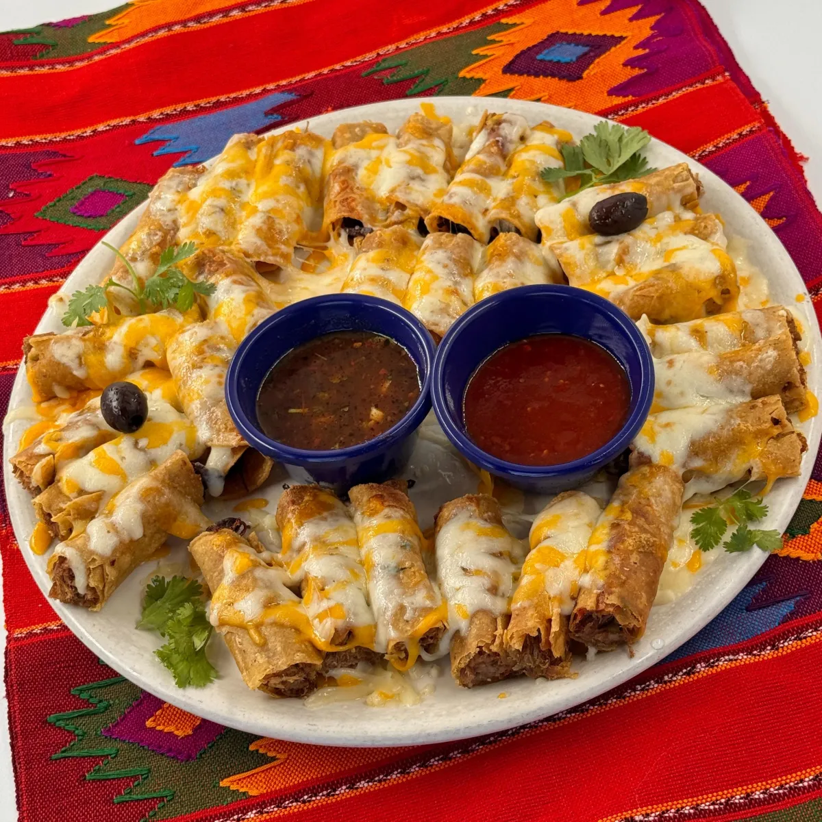 Muchisimos Taquitos rolled tacos appetizer photo at Casa De Pico