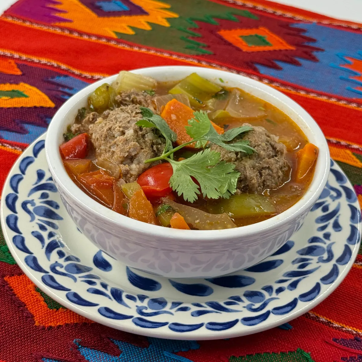Albóndiga soup with meatballs, vegetables and cilantro