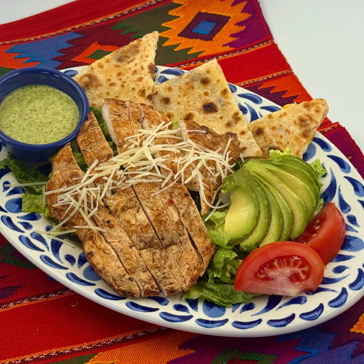 Chicken Caesar Salad with sliced grilled chicken at Casa de Pico
