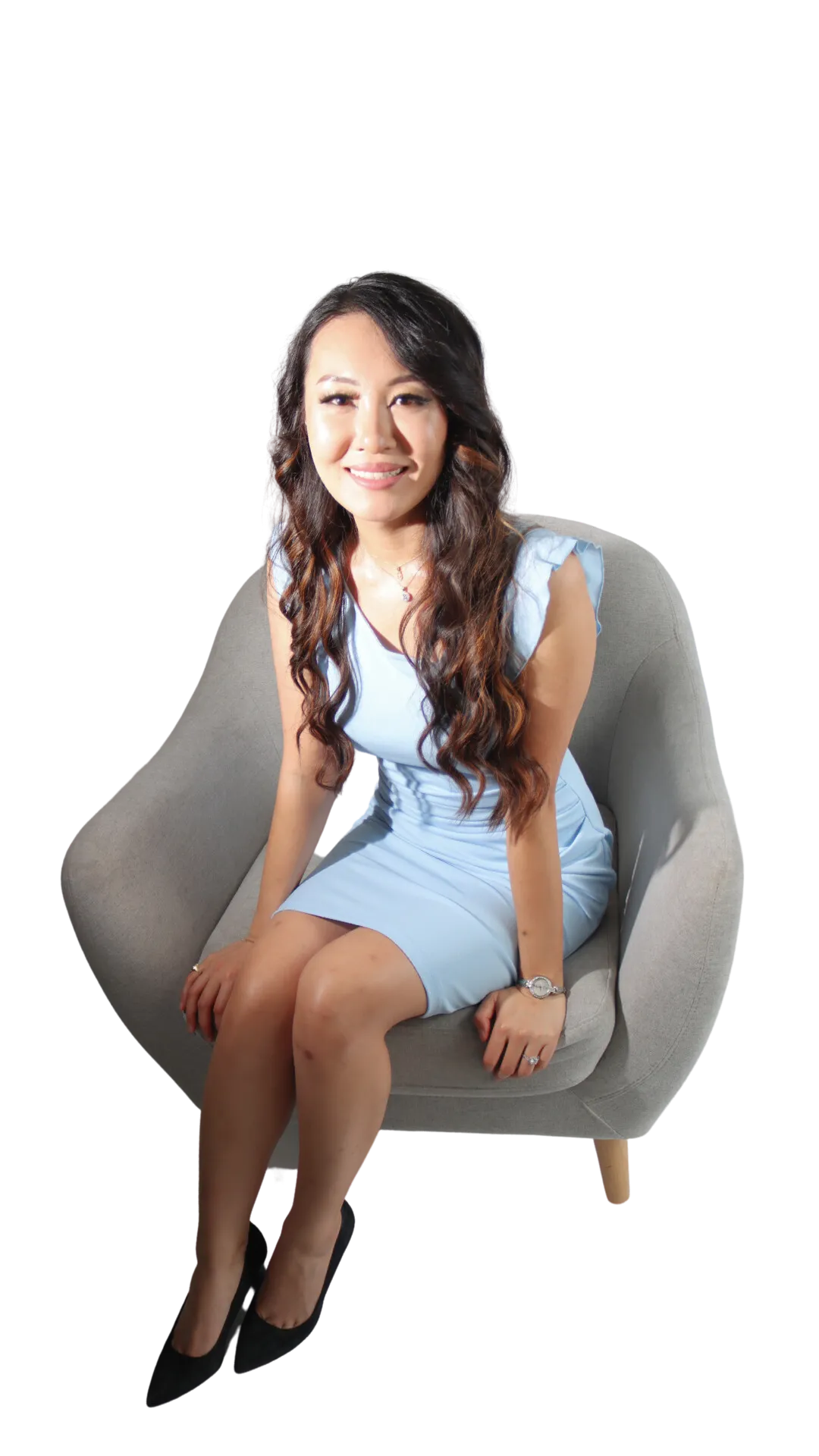 rachel brown founder of mybbff sitting in a chair wearing a blue dress