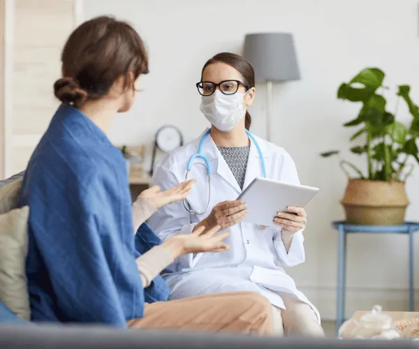 Doctor examining an injury after a Bellevue crash