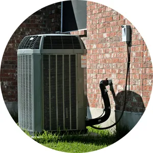 Air conditioning unit being repaired by certified HVAC tech in Phoenix