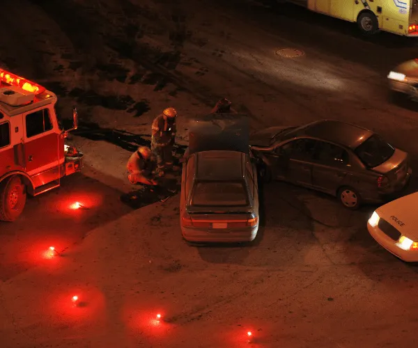 Emergency responders assisting after a car accident in Huntington, WV