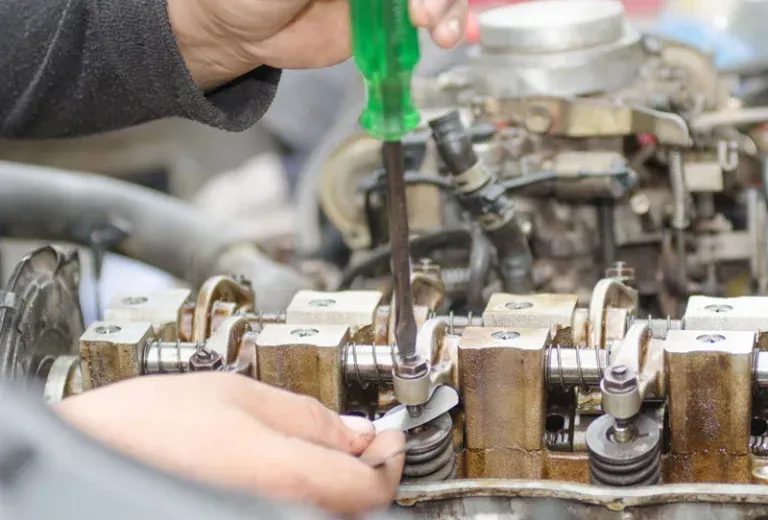 Technician performing preventative RV engine maintenance at Complete RV Service in St Charles Missouri