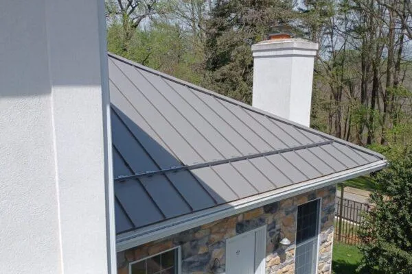 TEO Roofing team installing a roof on a Maryland home, highlighting quality roofing services and customer satisfaction.