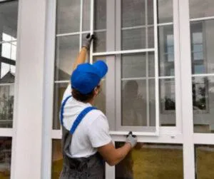 TEO Construction team replacing windows, showcasing energy-efficient options for Maryland homeowners.