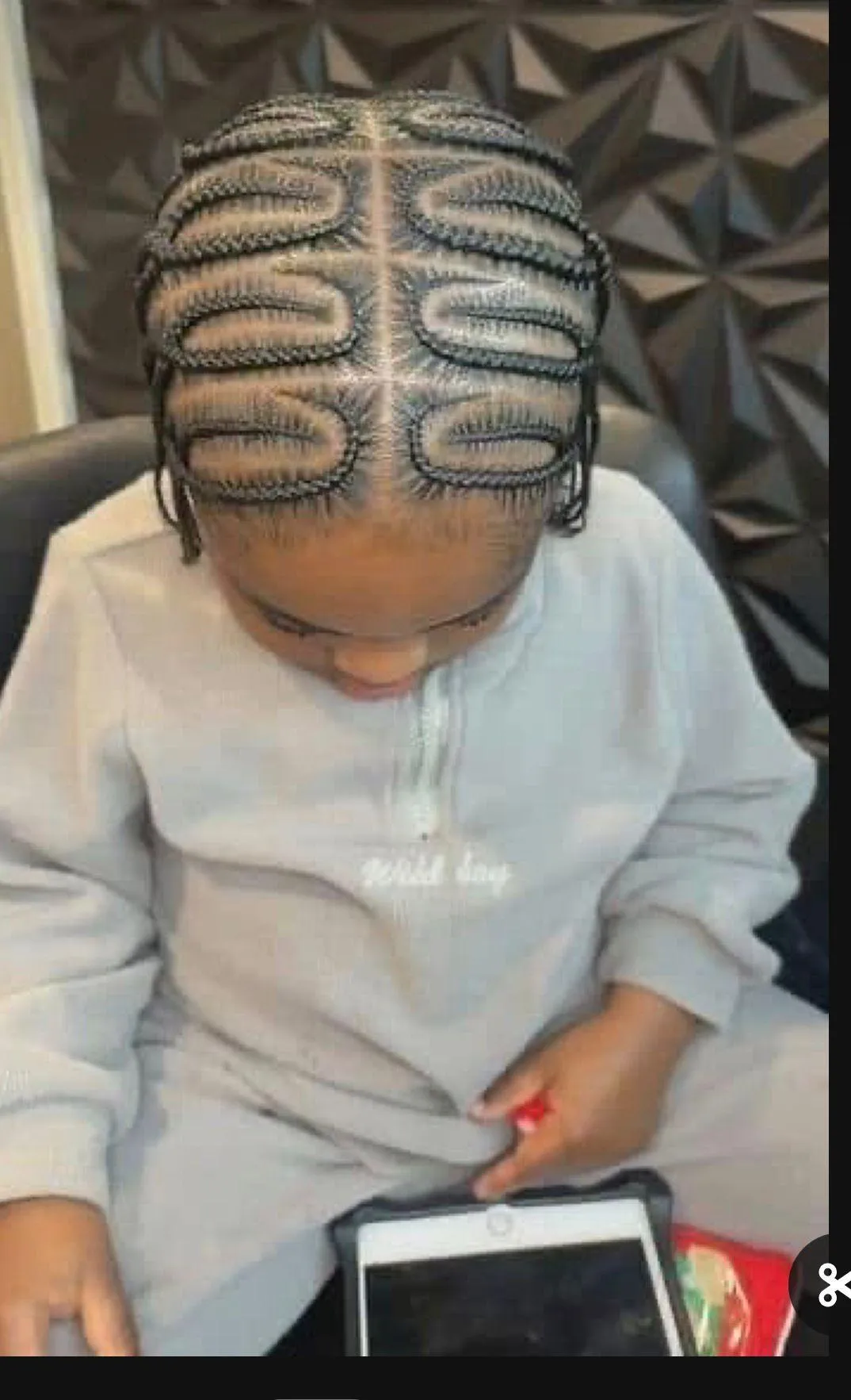 Gallery image showing a beautifully styled natural hair or braids