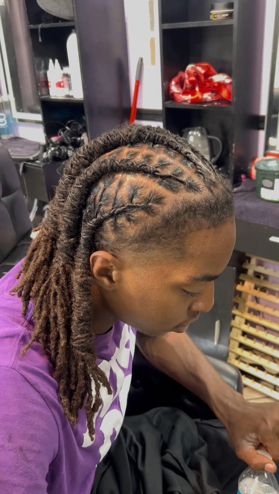 Editorial photo showcasing healthy, beautifully maintained locs and scalp wellness
