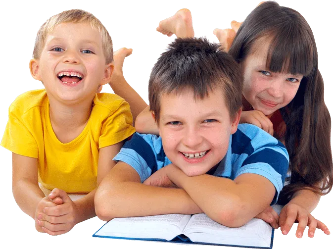 Occupational therapist kneeling at child height and guiding a small child with blocks in a bright therapy room.
