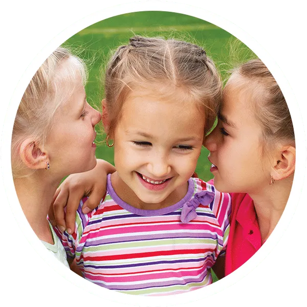 Child practicing breathing with a therapist in a calm corner