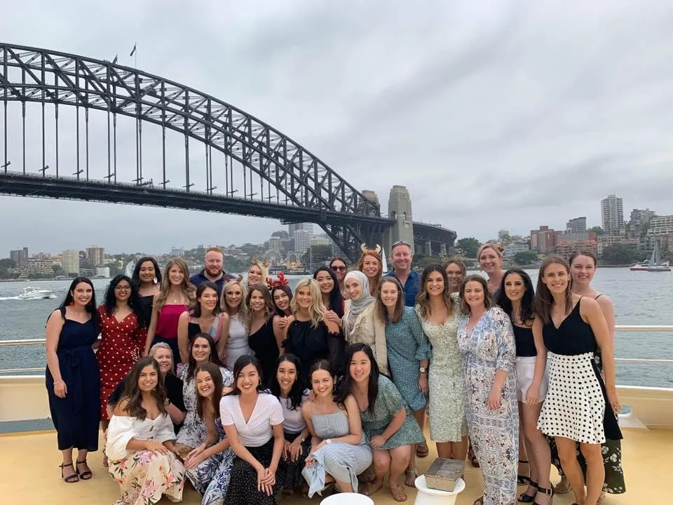 Paediatric clinicians collaborating in a bright community room, emphasizing teamwork and connection