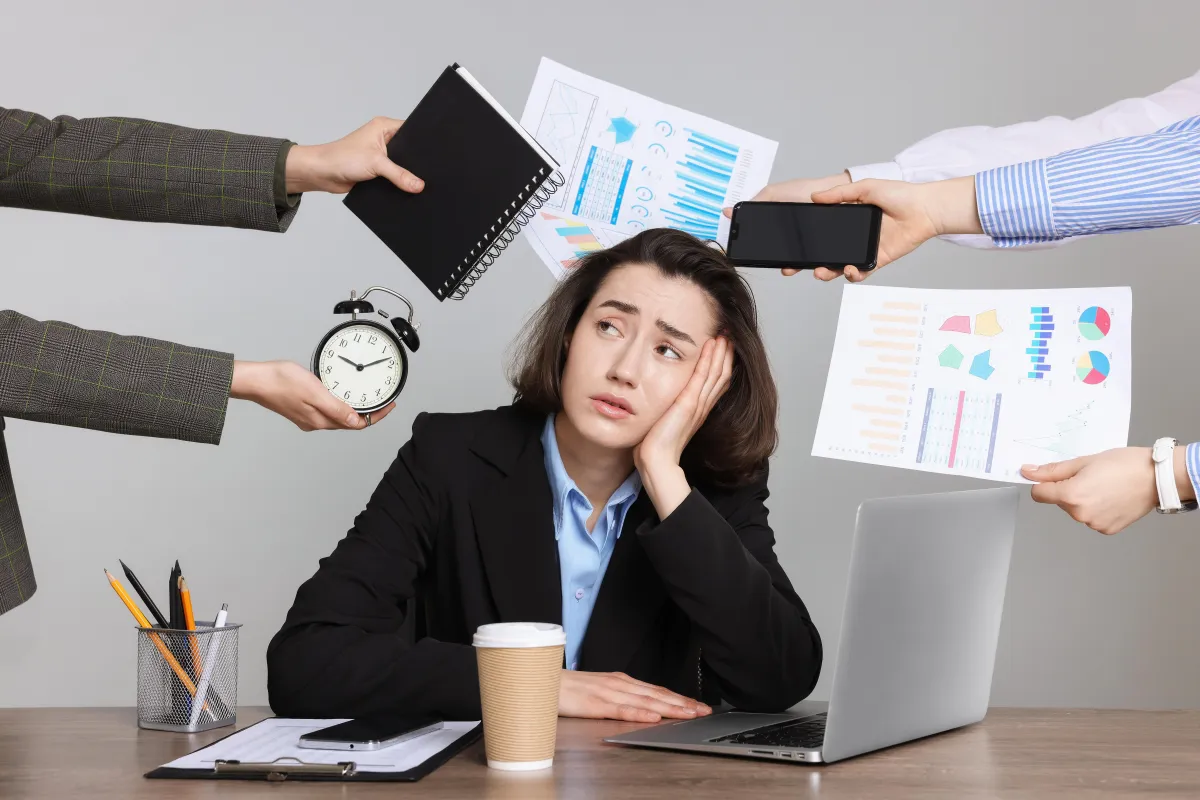 Woman overwhelmed with work