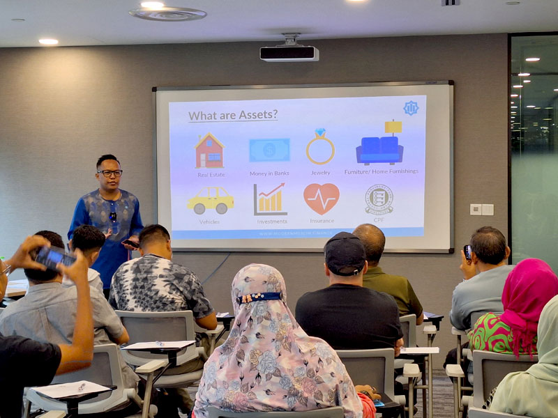 Participants learning about Faraid distribution during our Islamic Inheritance Workshop.