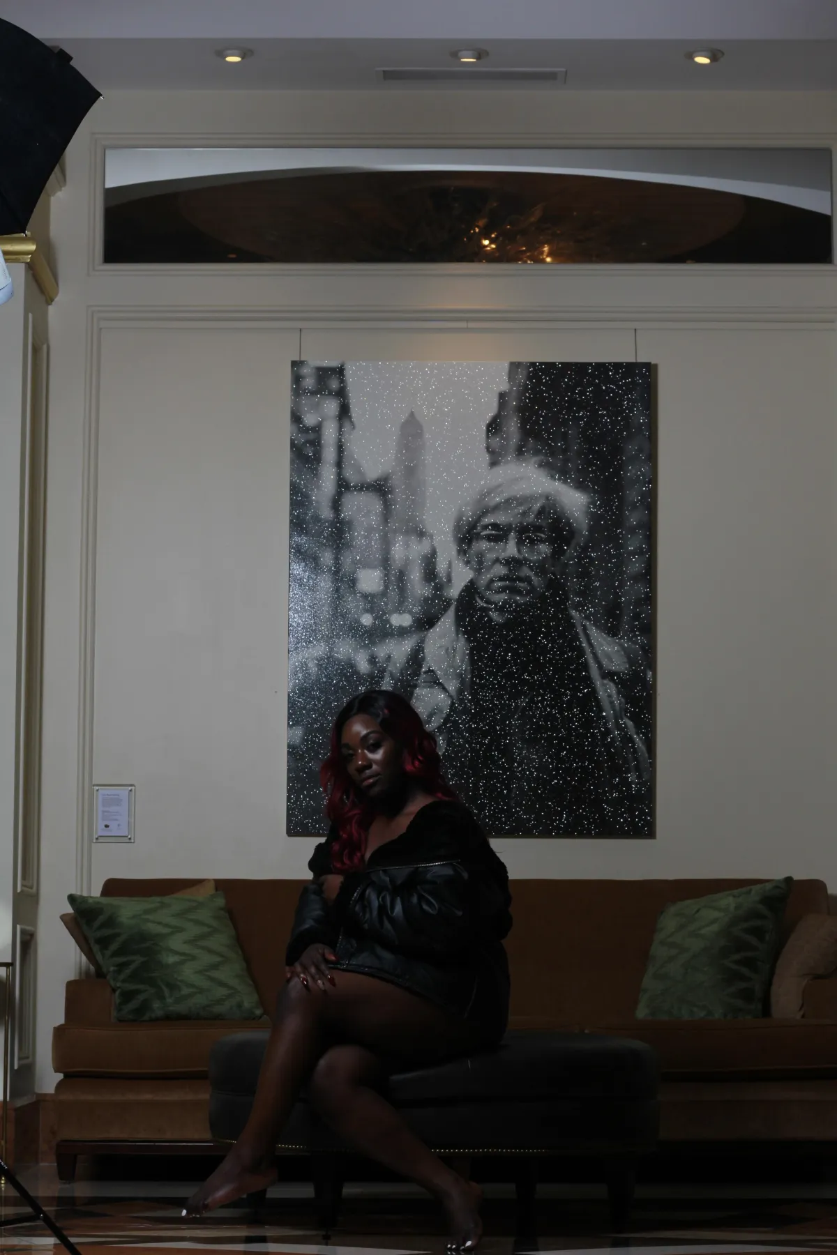 person with white and red floral tattoo on arm