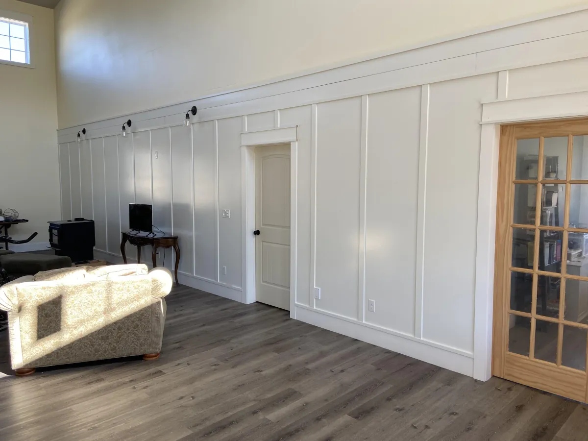 Living room with wood plank flooring