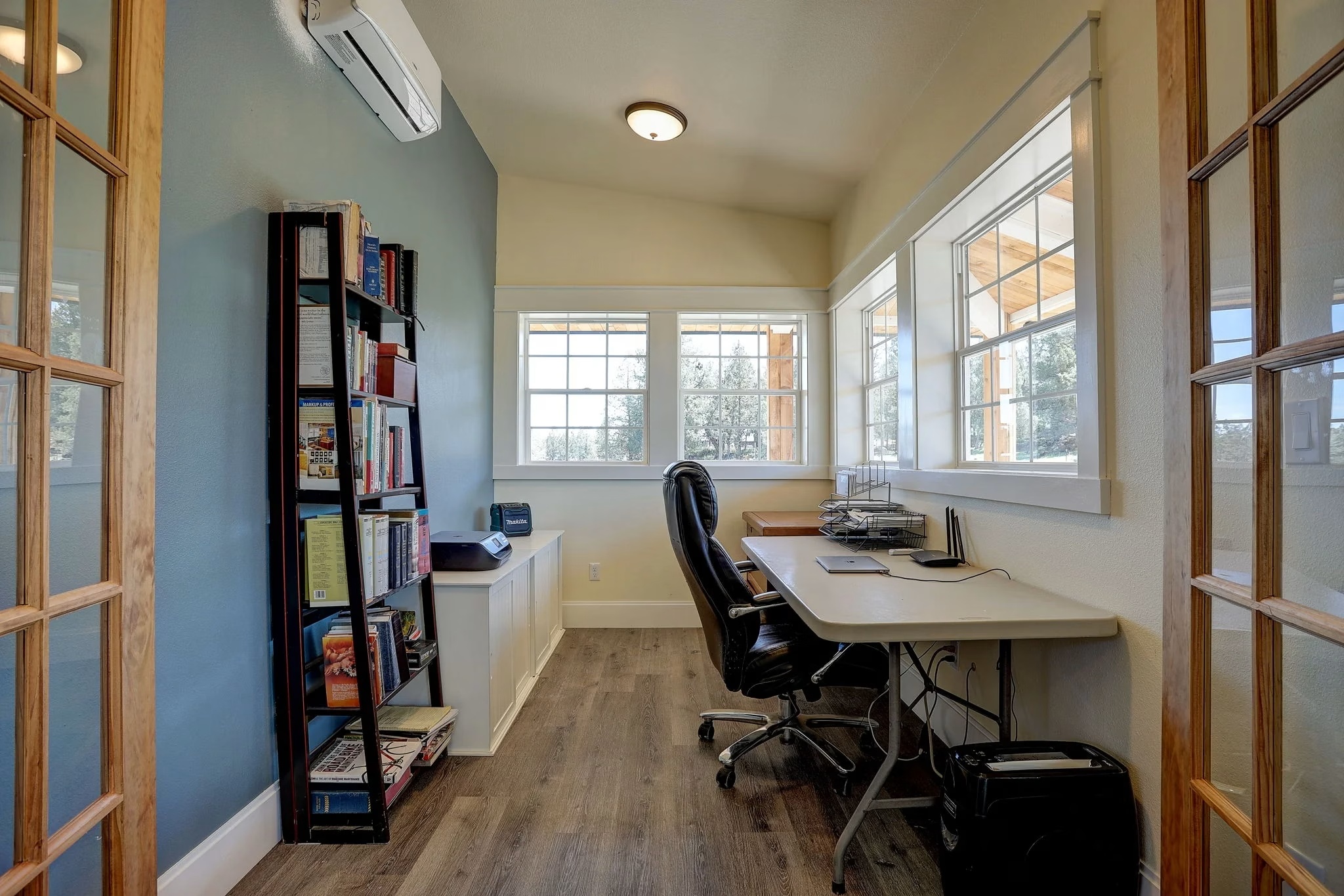 Home office with built-in shelving