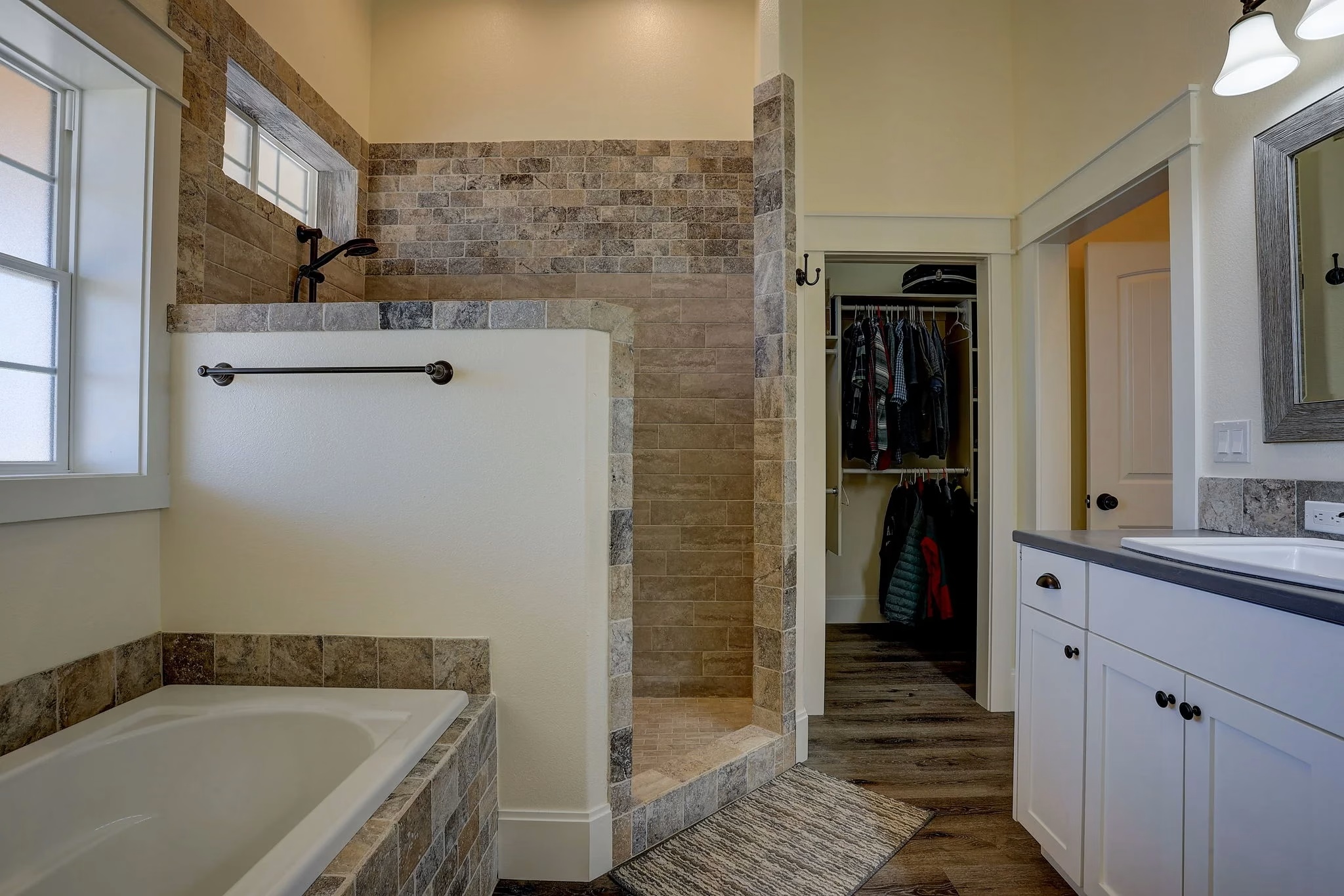 Bathroom remodel with stone shower wall