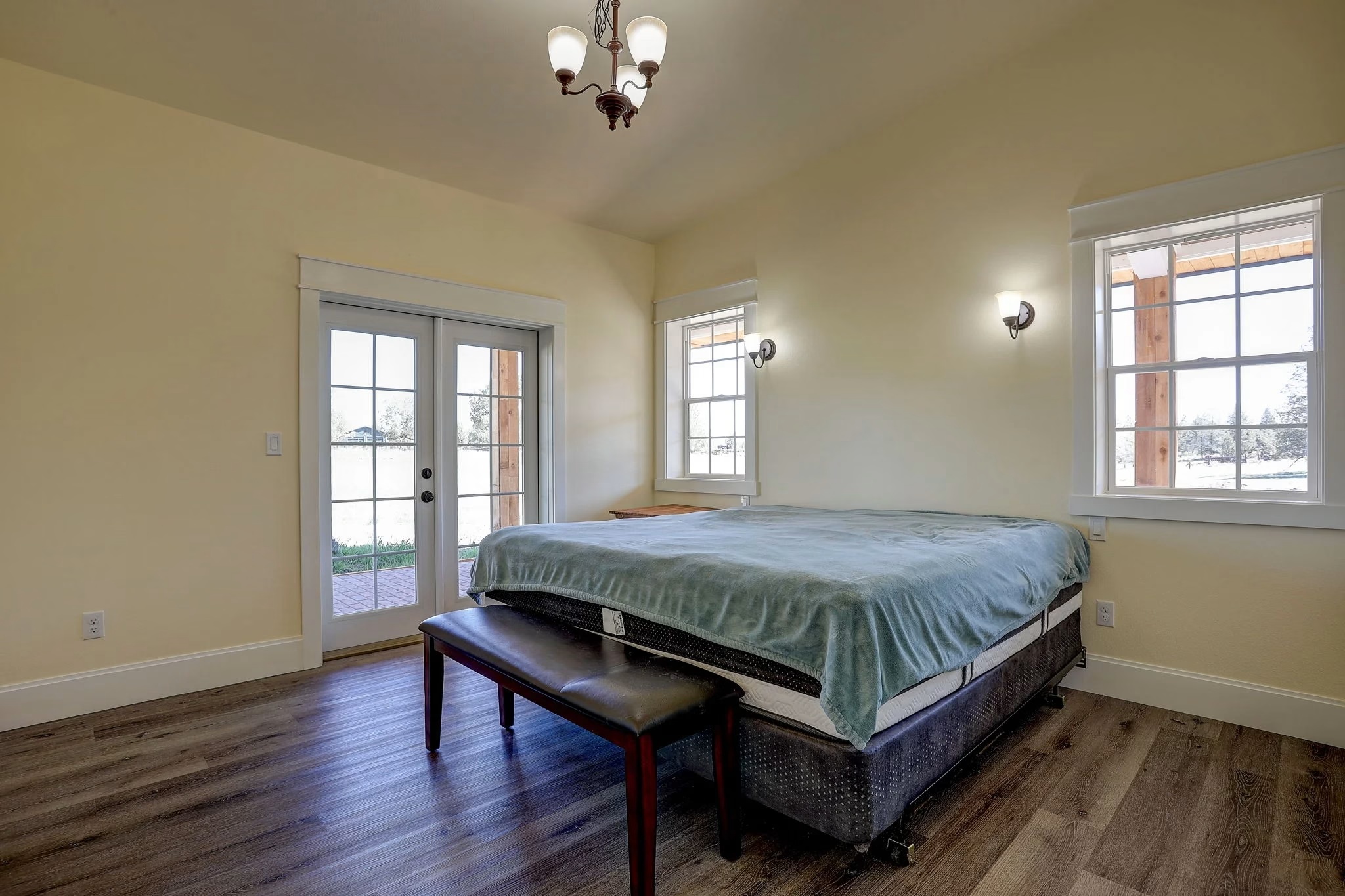 Bedroom with hardwood flooring