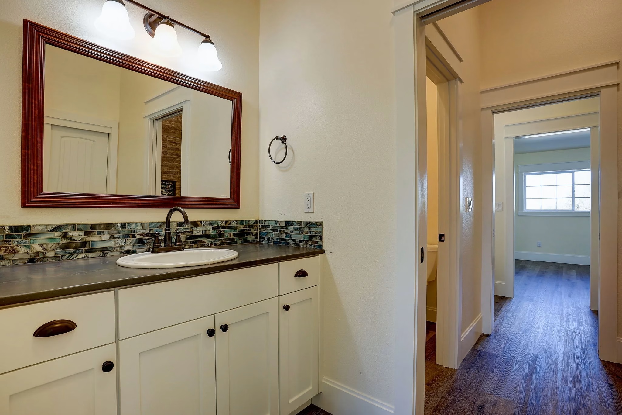Bathroom remodel with stone vanity counter