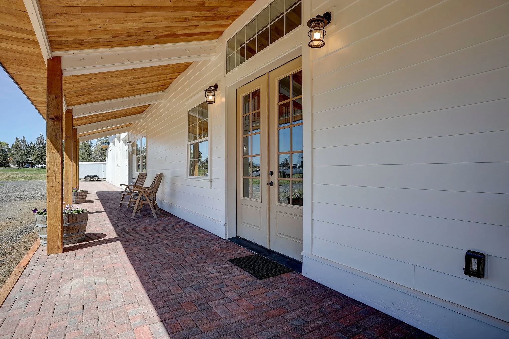 7. Covered entryway with French doors