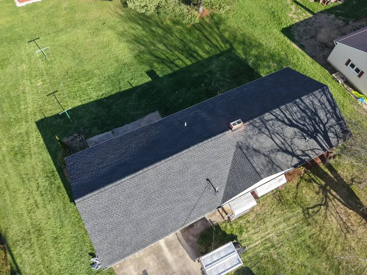 A completed lifetime shingle roof replacement on a home in Mansfield Ohio performed by Weikles Roofing.
