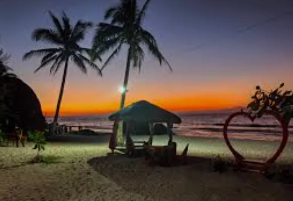 Snorkeler exploring coral garden in turquoise waters near Ba Tonying Beach Resort