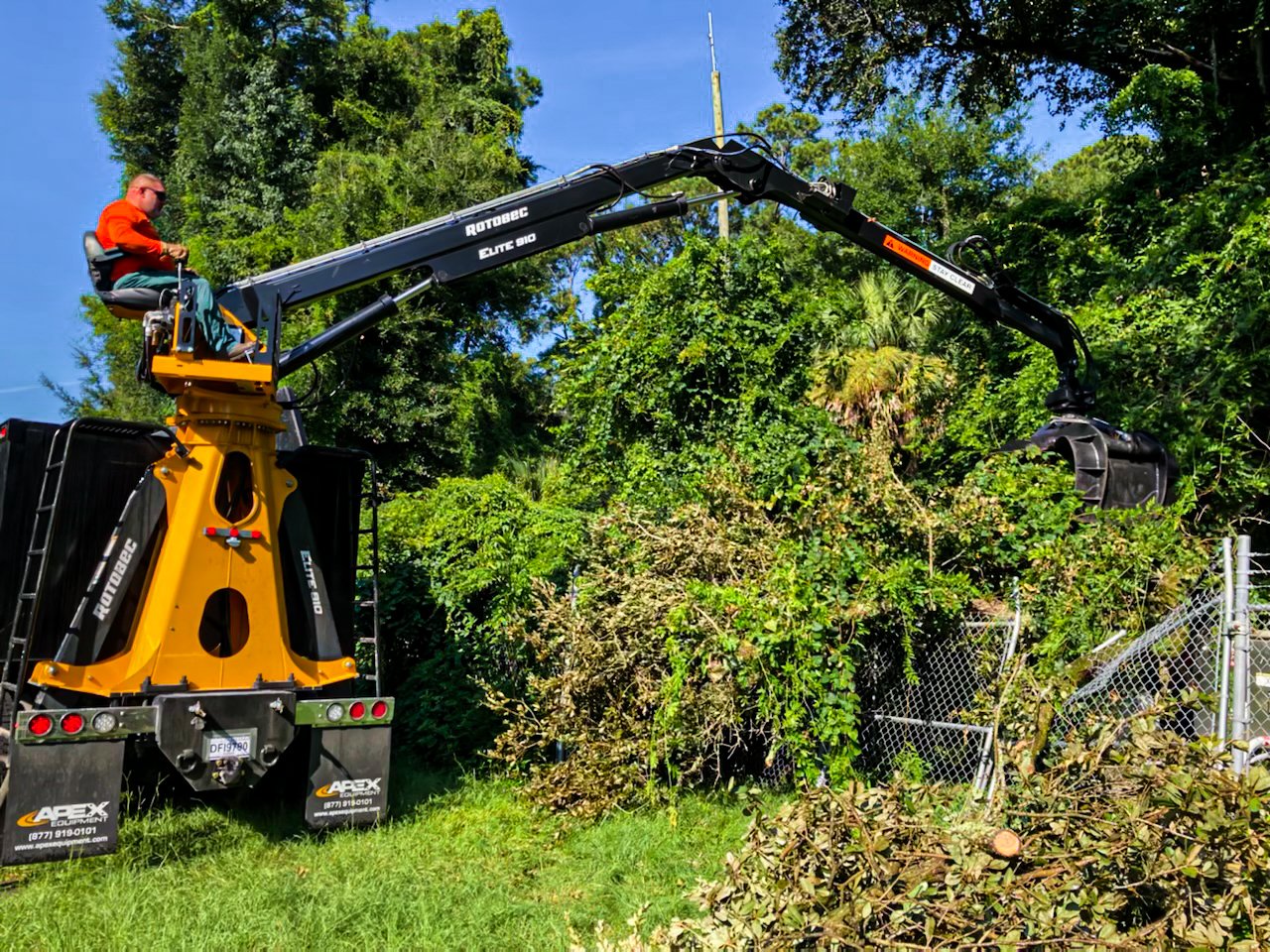 Clean Slate crew providing junk removal and full property cleanout services in Lubbock, clearing out unwanted items and debris from residential area.