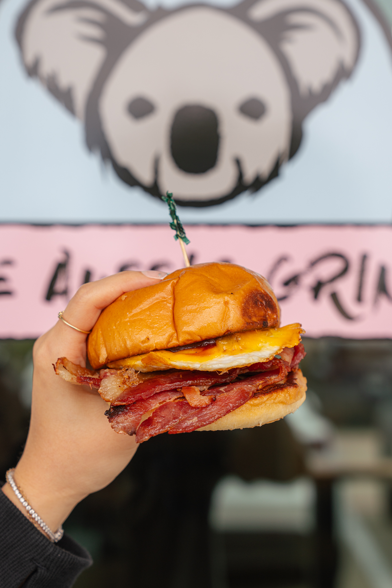 Certified Angus beef burger with rosemary fries at The Aussie Grind Frisco, TX