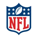 The NFL logo. A blue badge wtih stars and a football at the top. In the middle is the text "NFL" in red against a white backdrop.