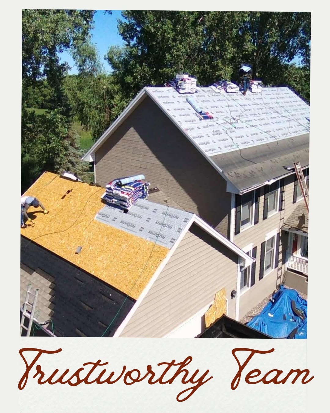Red tiled roof against a bright blue sky