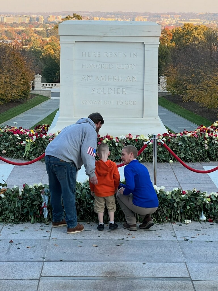 family visiting the tomb