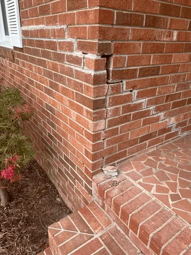 Brick stair step cracking repair on exterior of Burlington NC home