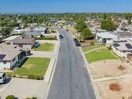 Small backyard deck with shade features in East Bakersfield