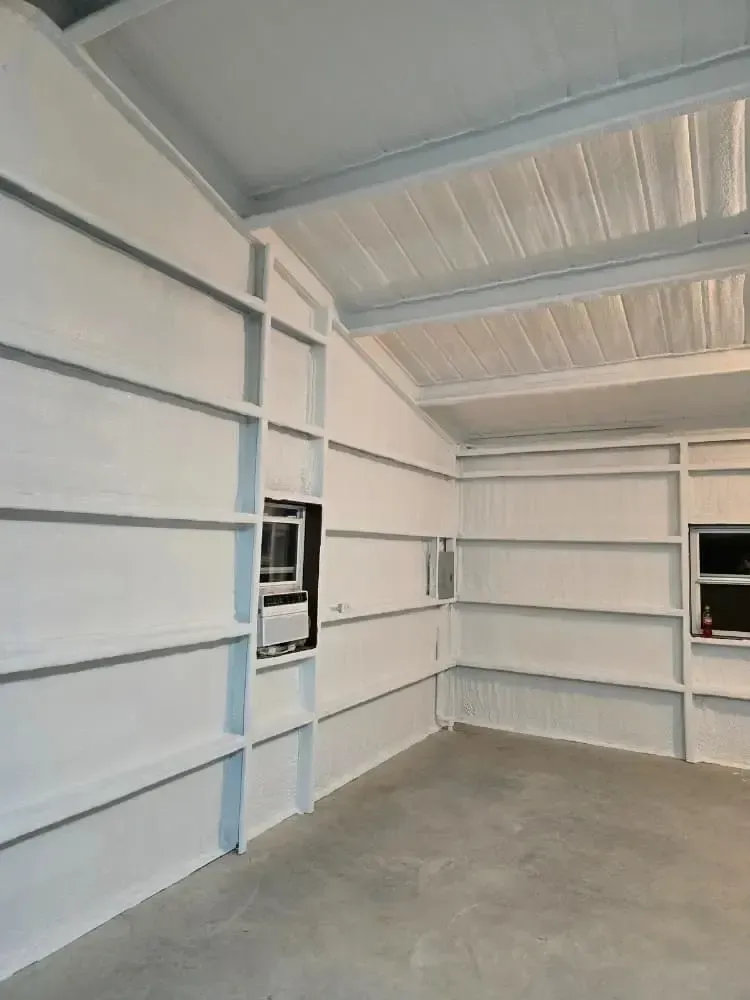Metal building interior finished with closed-cell spray foam insulation by 903 Spray Foam in Sumner, TX