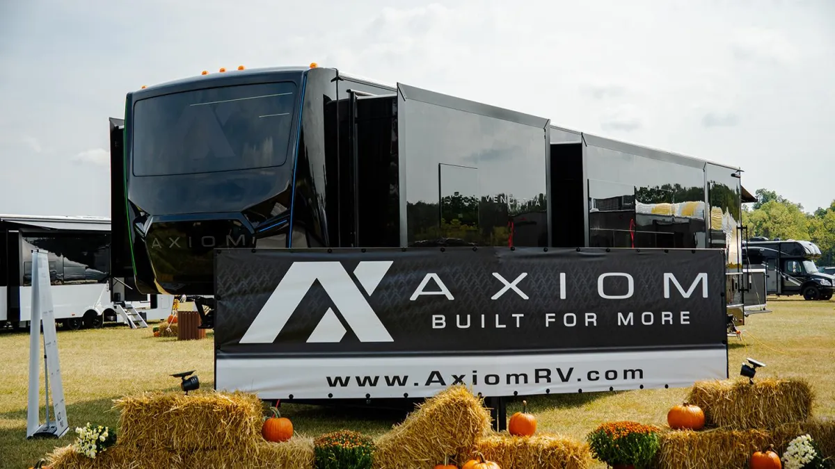 Axiom RV parked on grass