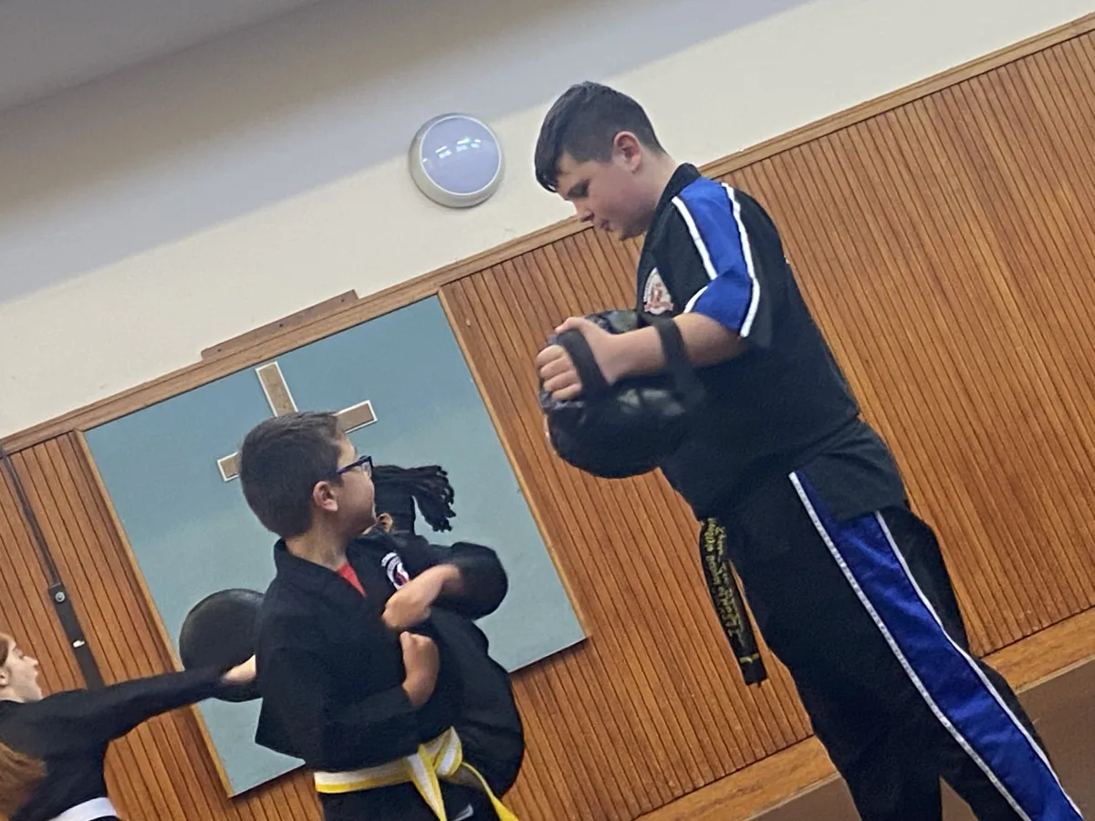 Junior Instructor Kyron working with the Beginners