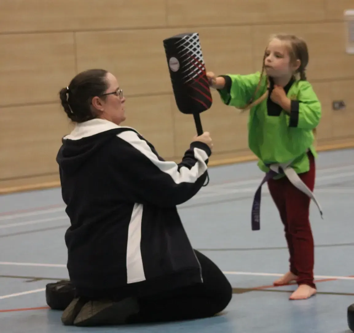 Instructor Sarah Askam working with the Little Monsters