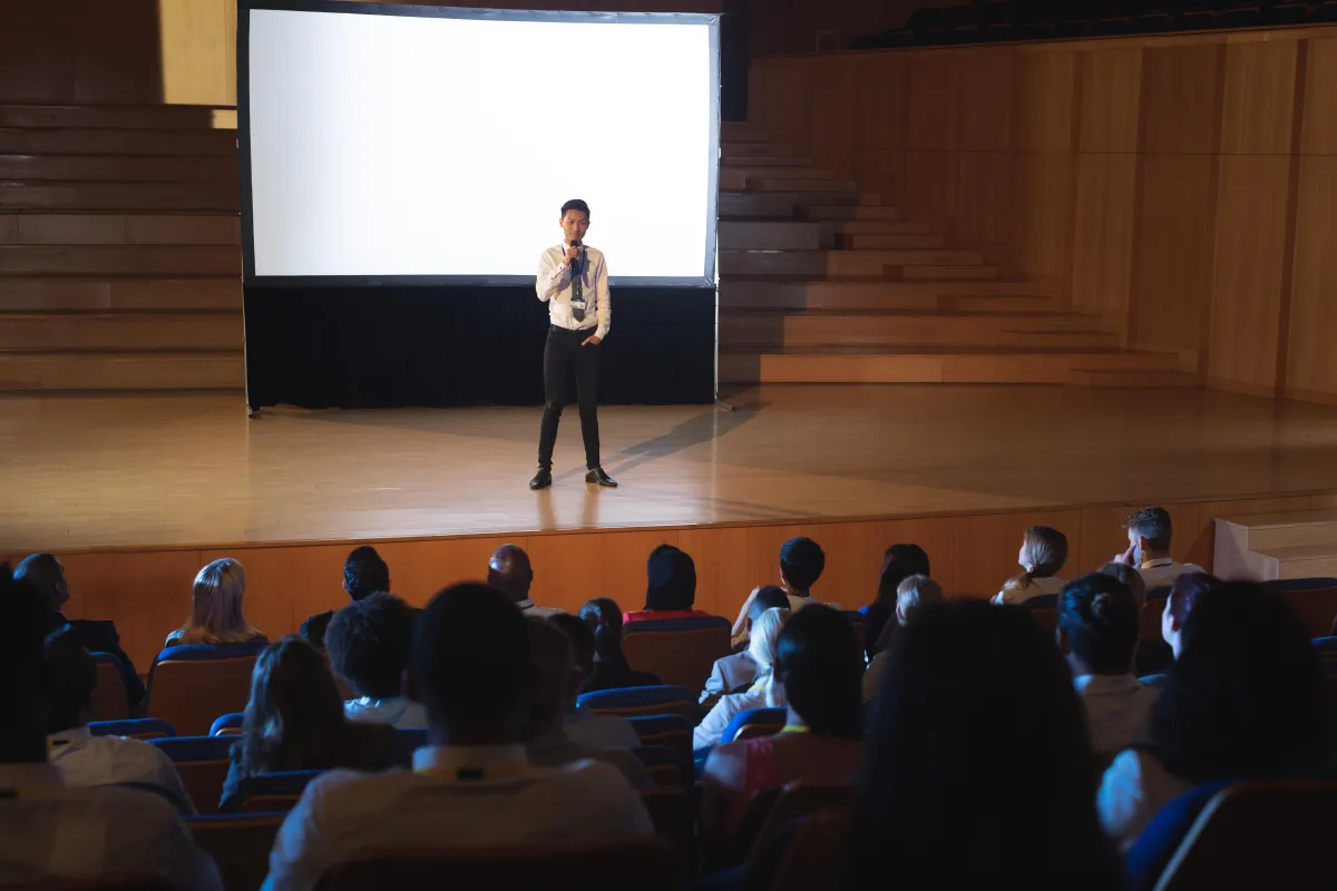 businessman-standing-and-giving-presentation