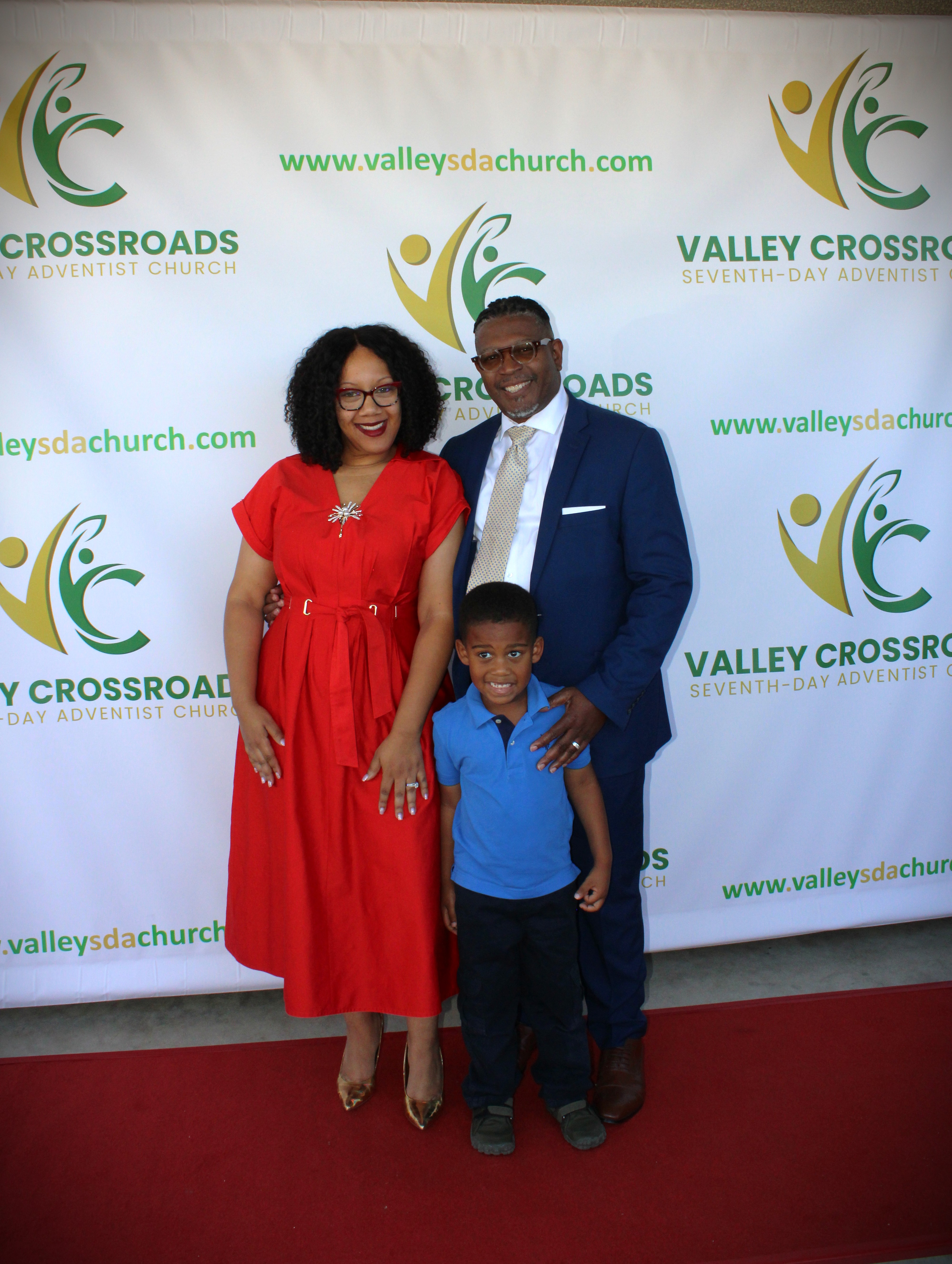 Warm and welcoming church family gathering at Valley Crossroads with parents and children connecting