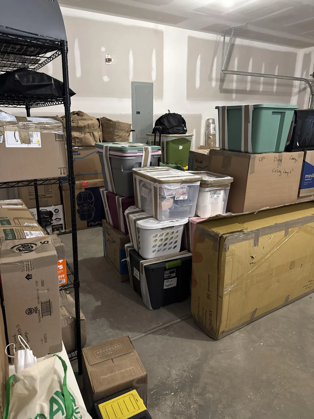 Bedroom full of moving boxes to unpack