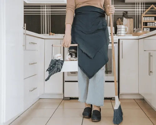 house cleaner cleaning kitchen