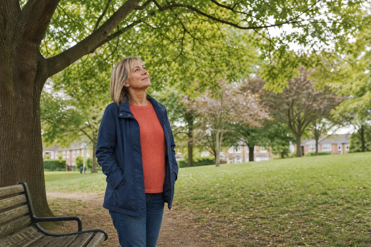 Woman running thoughtfully on a wooded trail