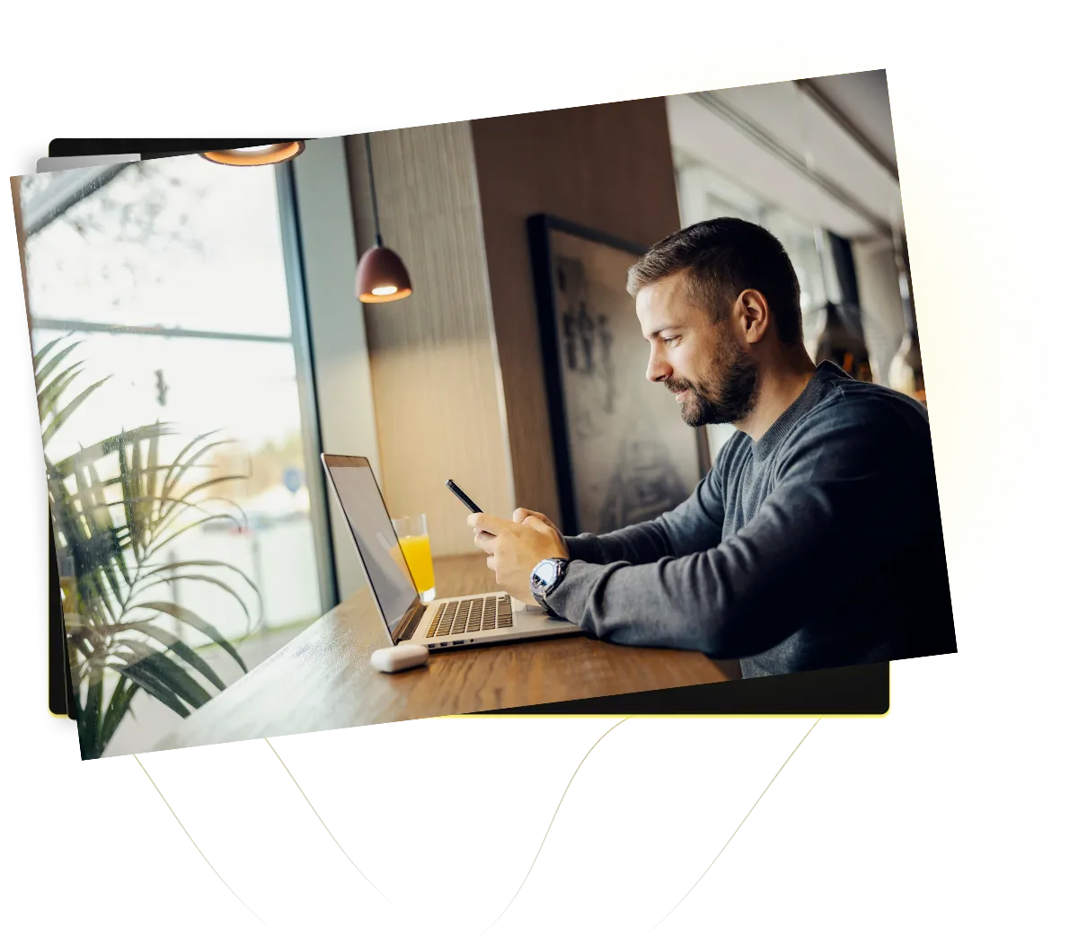 man seaching on computer and phone